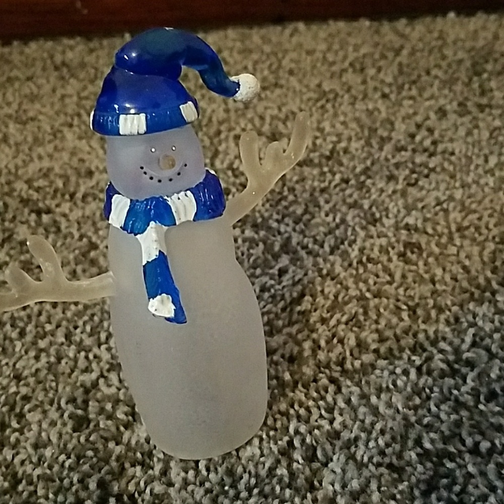 A glass snowman